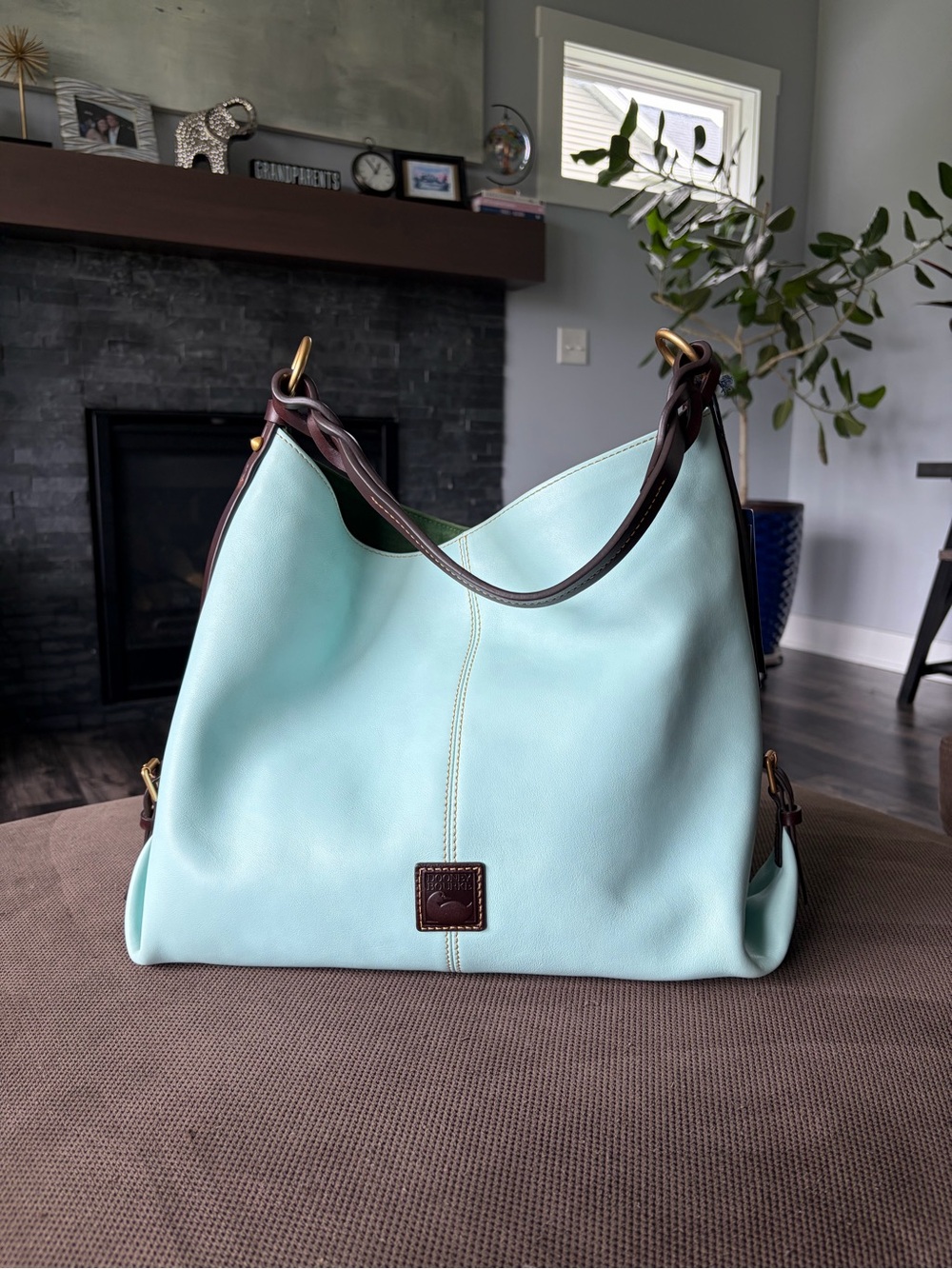 Dooney & Bourke NWT sky blue Twist Sac